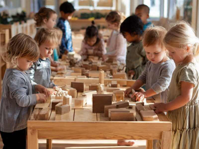 Children learning through movement and collaboration in a flexible early childhood learning environment.